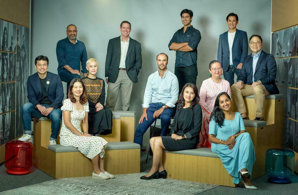 Corporate photography for group portraits with studio lightings 2022. Warner Bros. Discovery ISEAK Leadership Team in Singapore office.