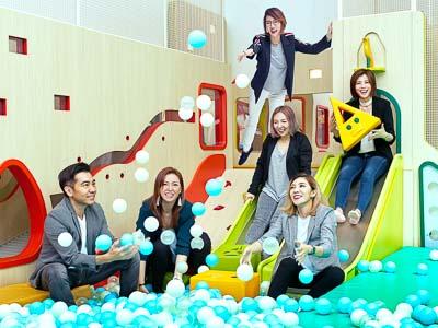 Group portraits photography for corporate with studio lighting at indoor playground, Tuckys photography