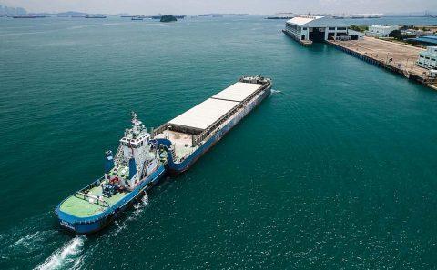 Industrial photography project with drone image of barge and semakau island