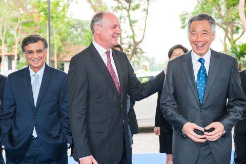 Singapore corporate events photography capturing the interactions between PM Lee and Paul Poulman during the welcome session of the unilever four acre campus offiical opening ceremony.