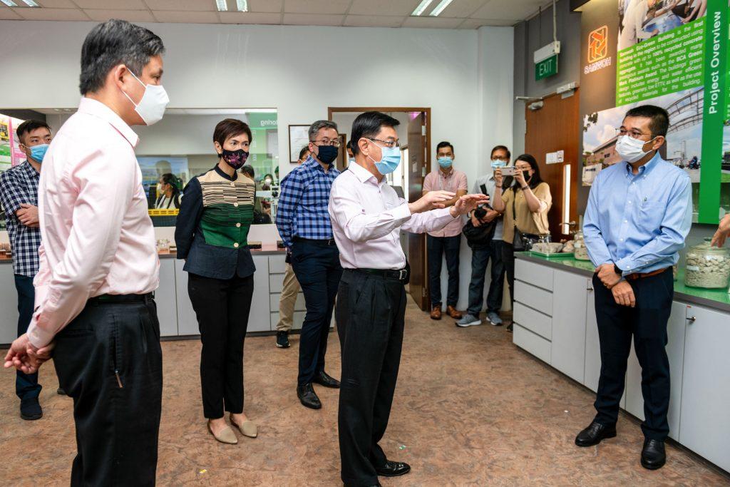 Interactions photos taken during Singapore ministers' visit by professional photographer. Three ministers from Singapore cabinet paid a visit to Samwoh Innovation Centre amid the height of the pandemic.