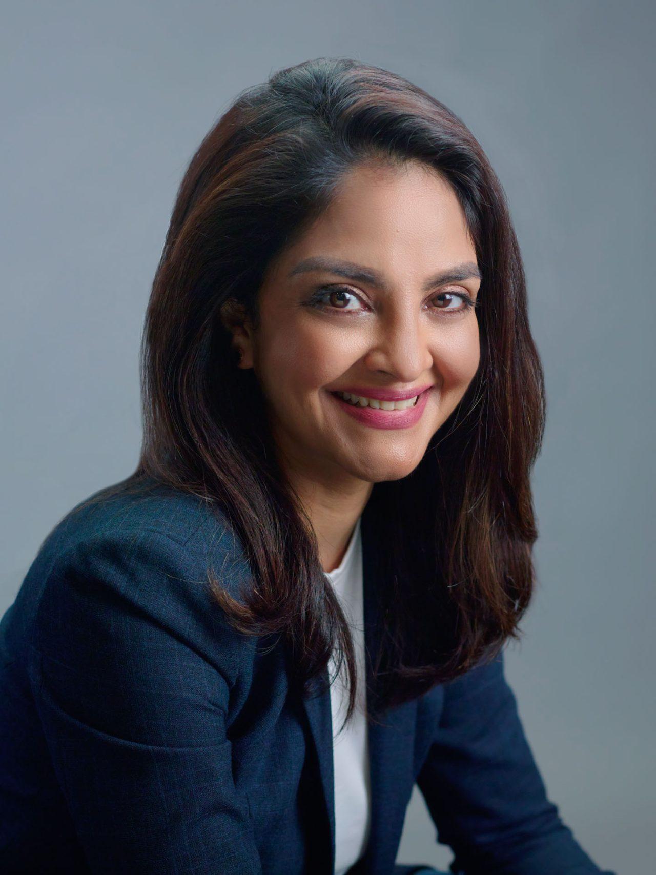 Corporate Studio portrait, professional business headshot with a grey background