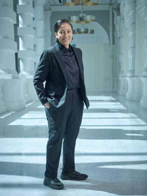 professional full body portraiture for female director for Singapore Arts festival SIFA. On-location business profile photoshoot.