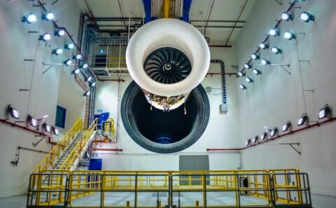 The interior of an aero engine test cell with a turbofan suspended in the bay. Industrial interior photography in Singapore.